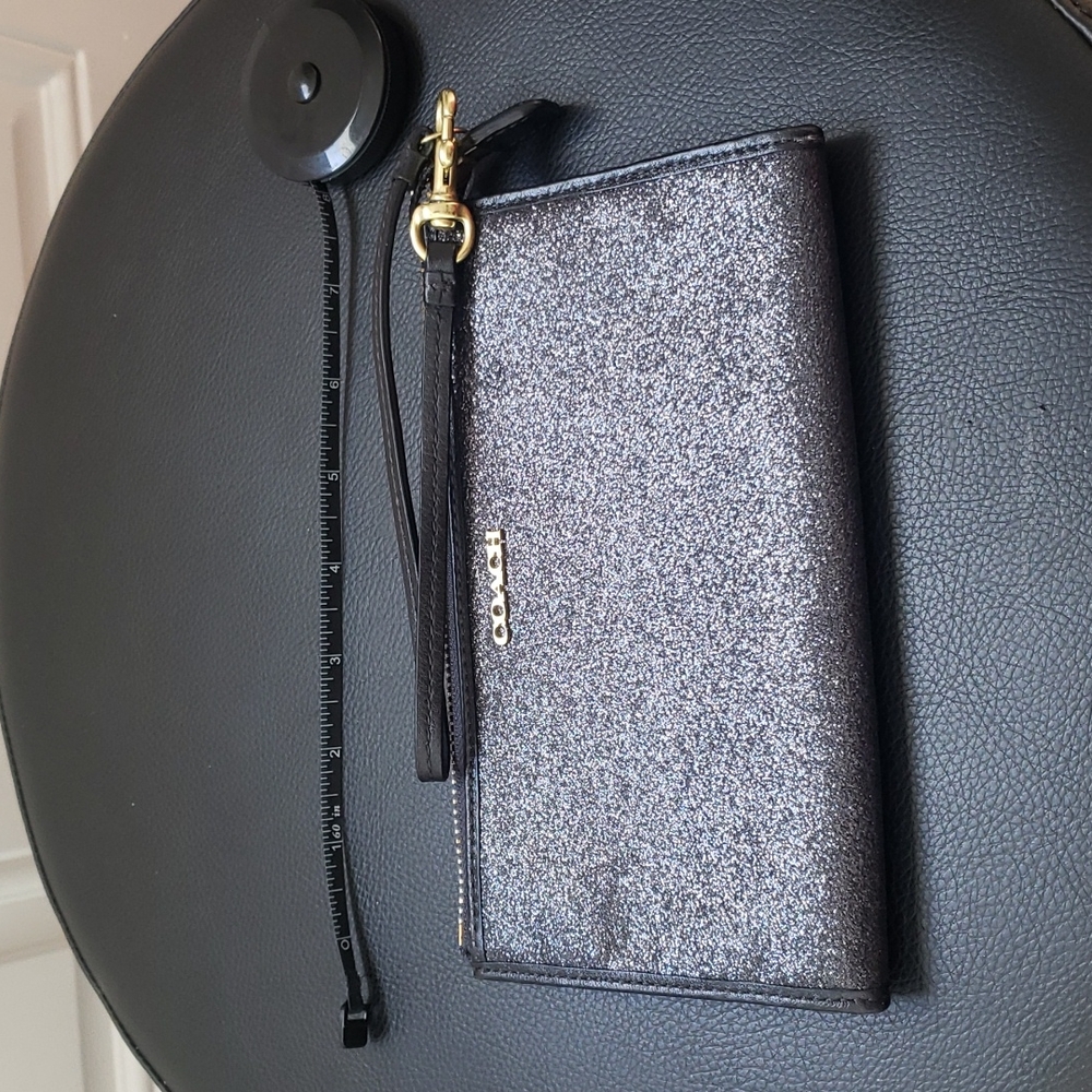 Sparkly black coach wristlet